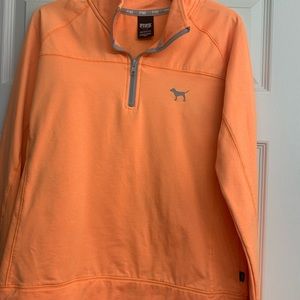 Pink quarter zip pullover.